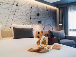 Premium bedding, desk, blackout curtains, soundproofing