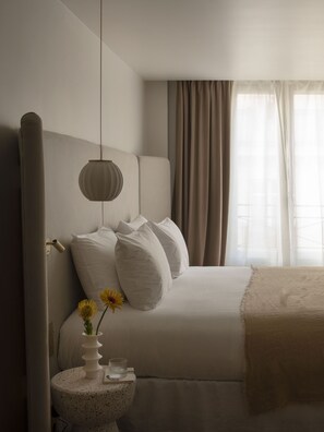 Premium bedding, in-room safe, individually decorated