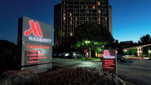 A Marriott hotel with a Century Center sign, indicating registration, Century Ballroom, and Meeting Rooms. - Atlanta Marriott Northeast/Emory Area (Atlanta)