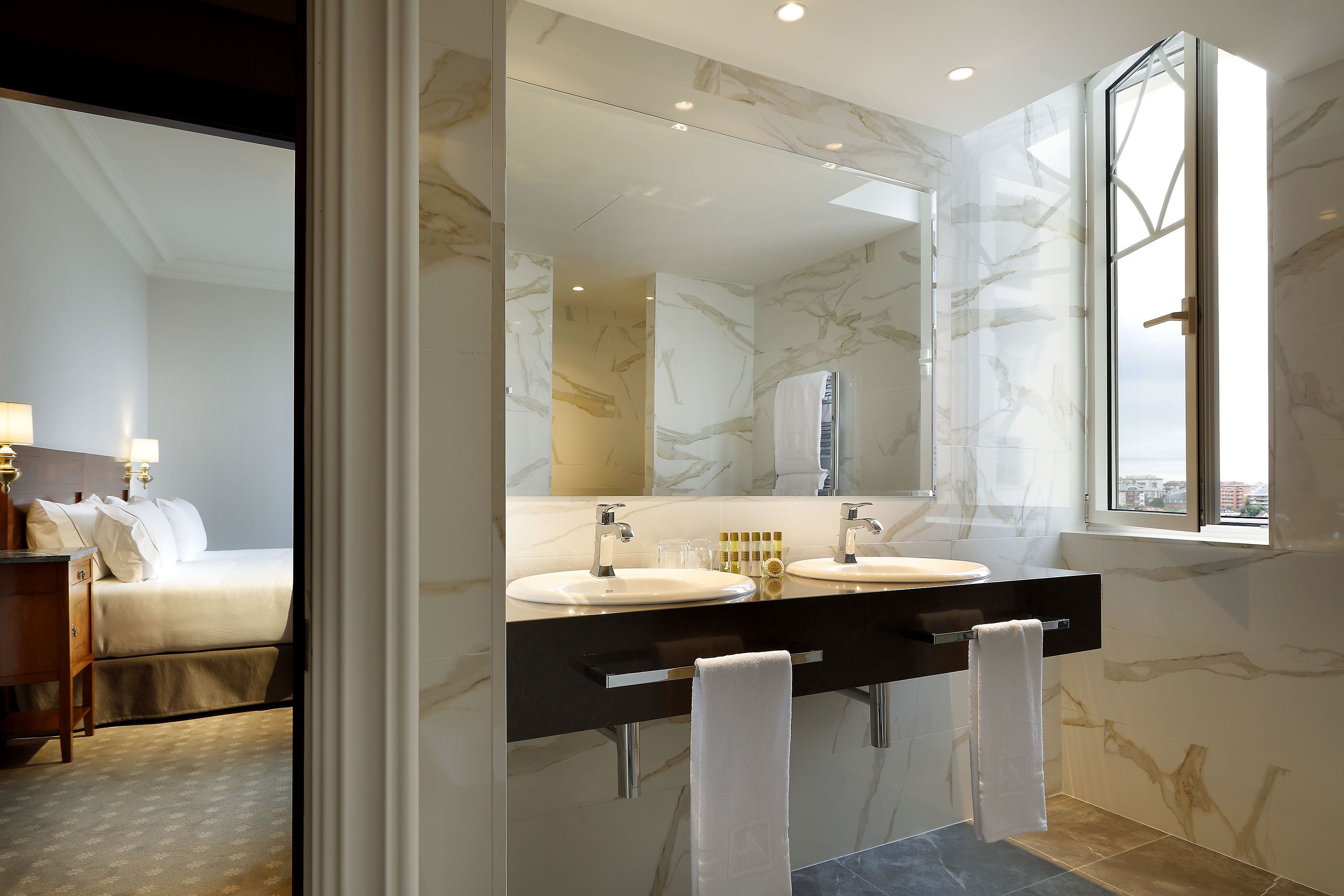 shower, eco-friendly toiletries, hair dryer, towels