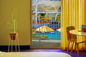 Hotel room view looking out at The Saguaro Palm Springs