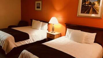 Pillow-top beds, desk, blackout curtains, iron/ironing board