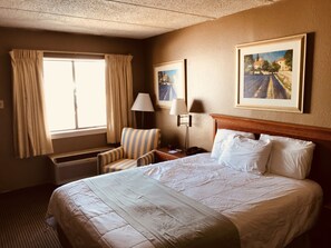 Pillow-top beds, desk, blackout curtains, iron/ironing board
