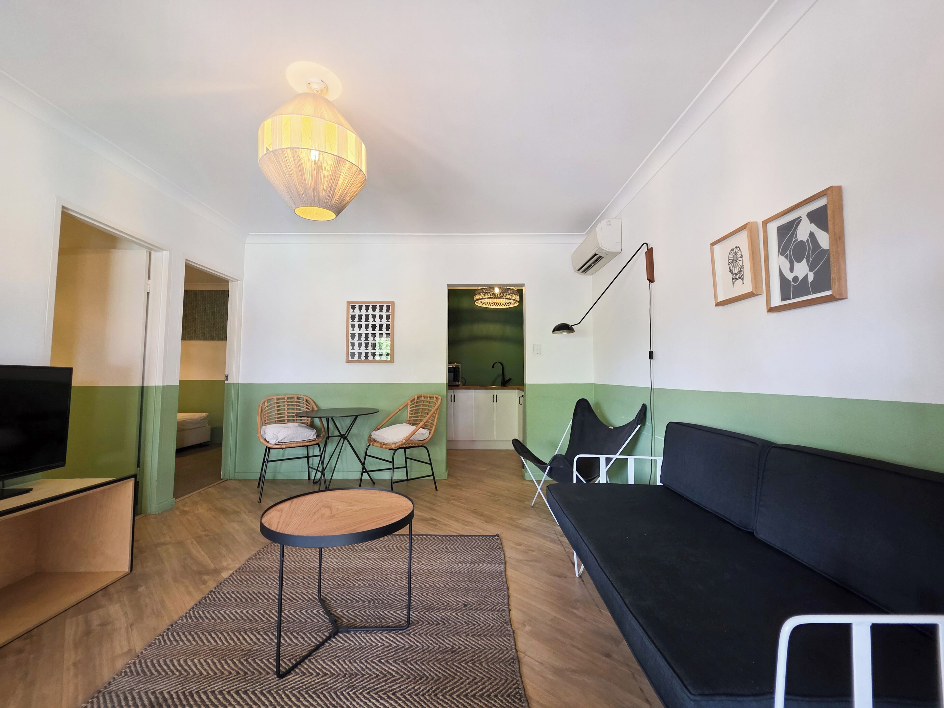 Toro Suite (Two Bedroom, Kitchenette) | Desk, laptop workspace, iron/ironing board, bed sheets