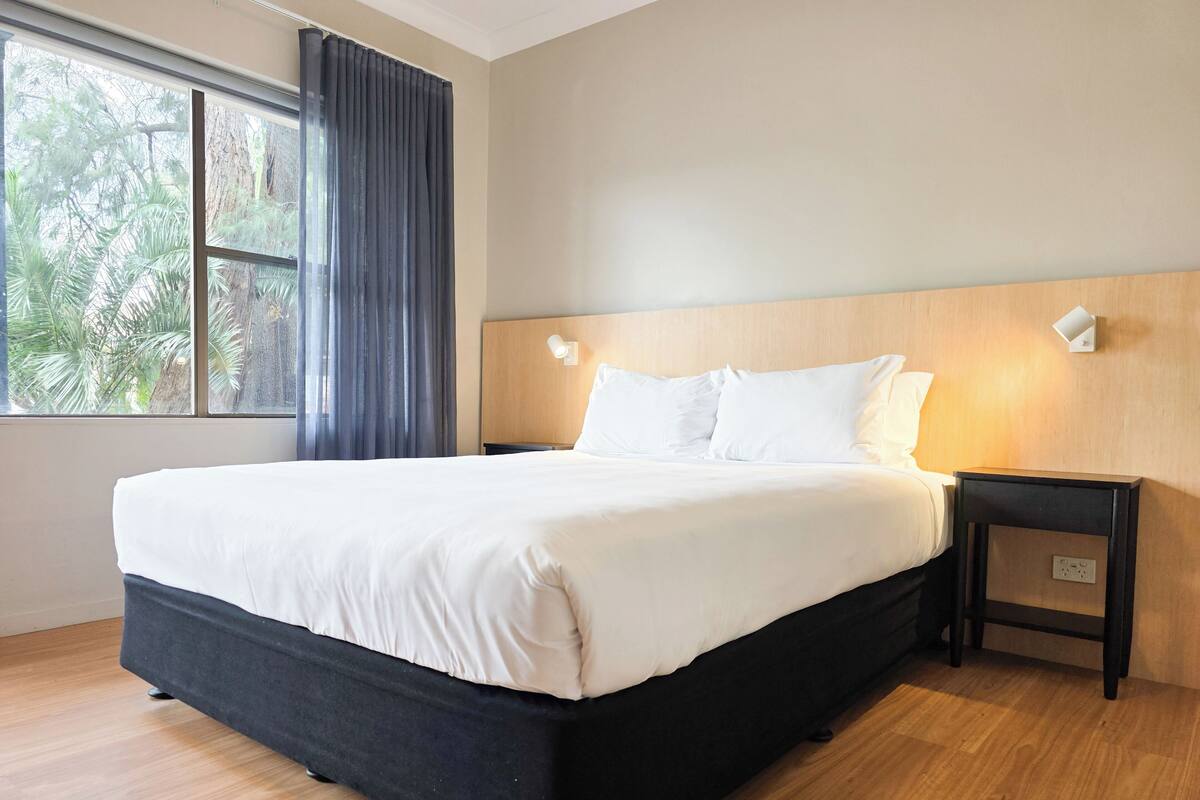 Family Room (One Bedroom) | Iron/ironing board, bed sheets