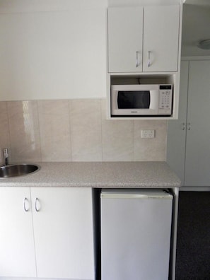 Deluxe King & Single Suite  | Private kitchenette