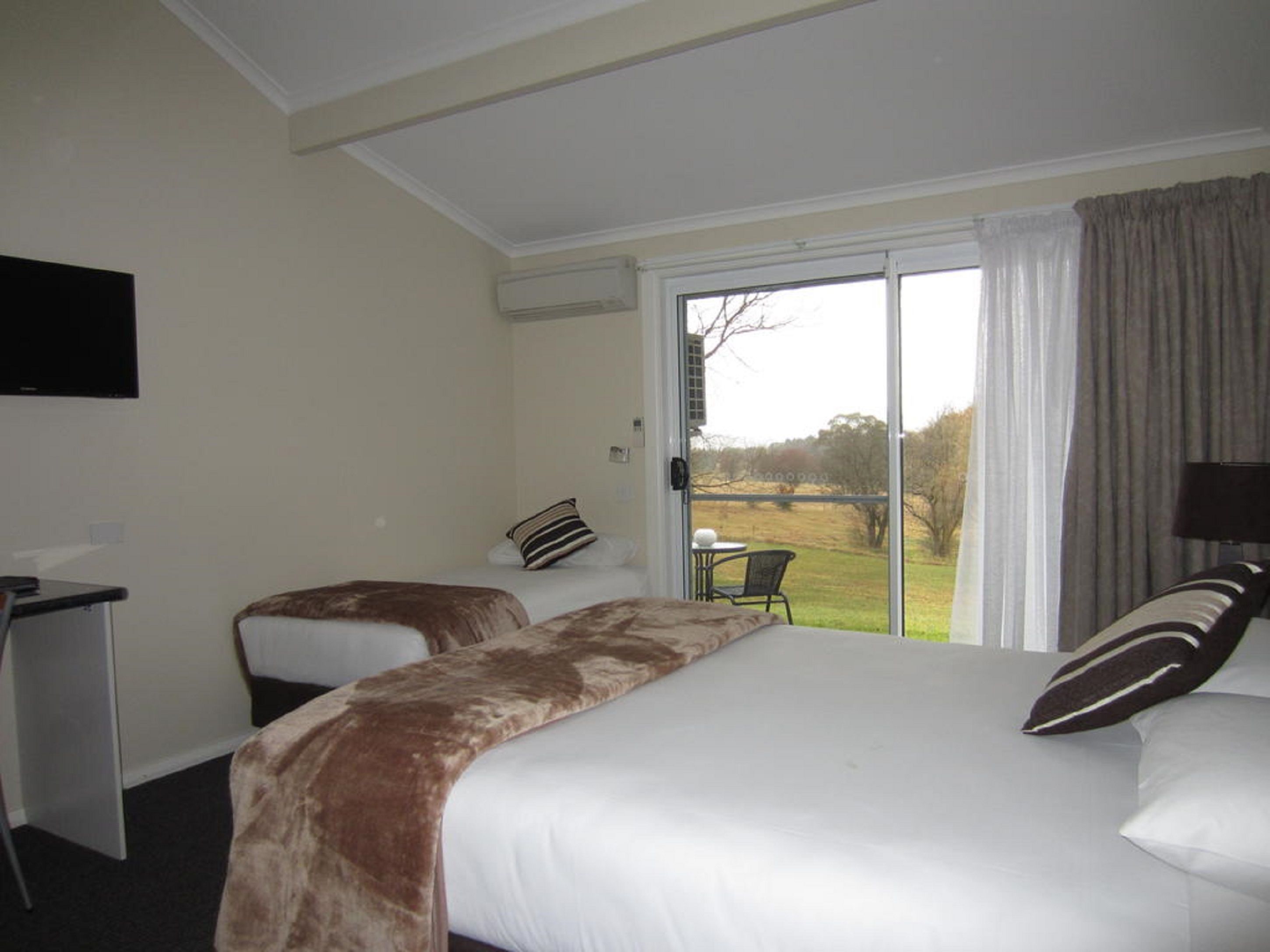 Deluxe Room -  Queen and Single | Minibar, desk, iron/ironing board, cots/infant beds