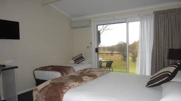 Deluxe Room - Queen and Single | Minibar, desk, iron/ironing board, cots/infant beds