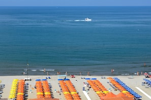 Private beach nearby, beach towels, beach bar