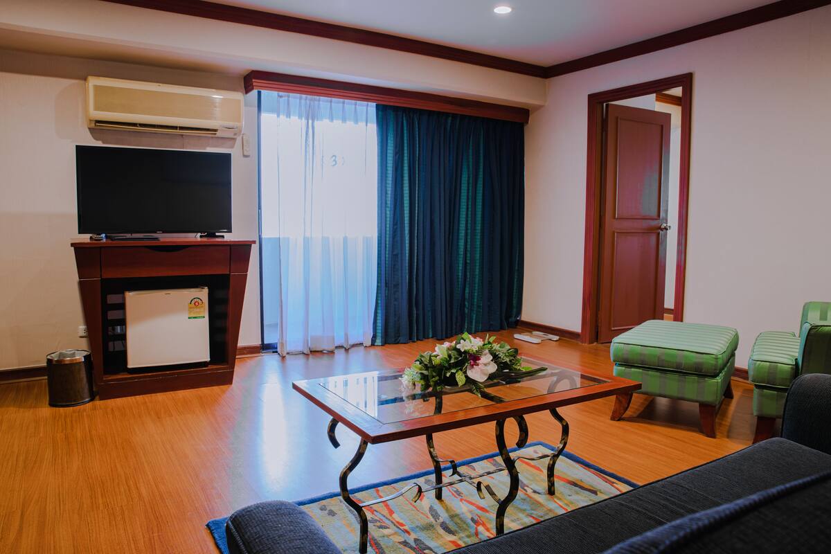 Suite – executive, 1 dobbeltseng | Oppholdsområde | TV