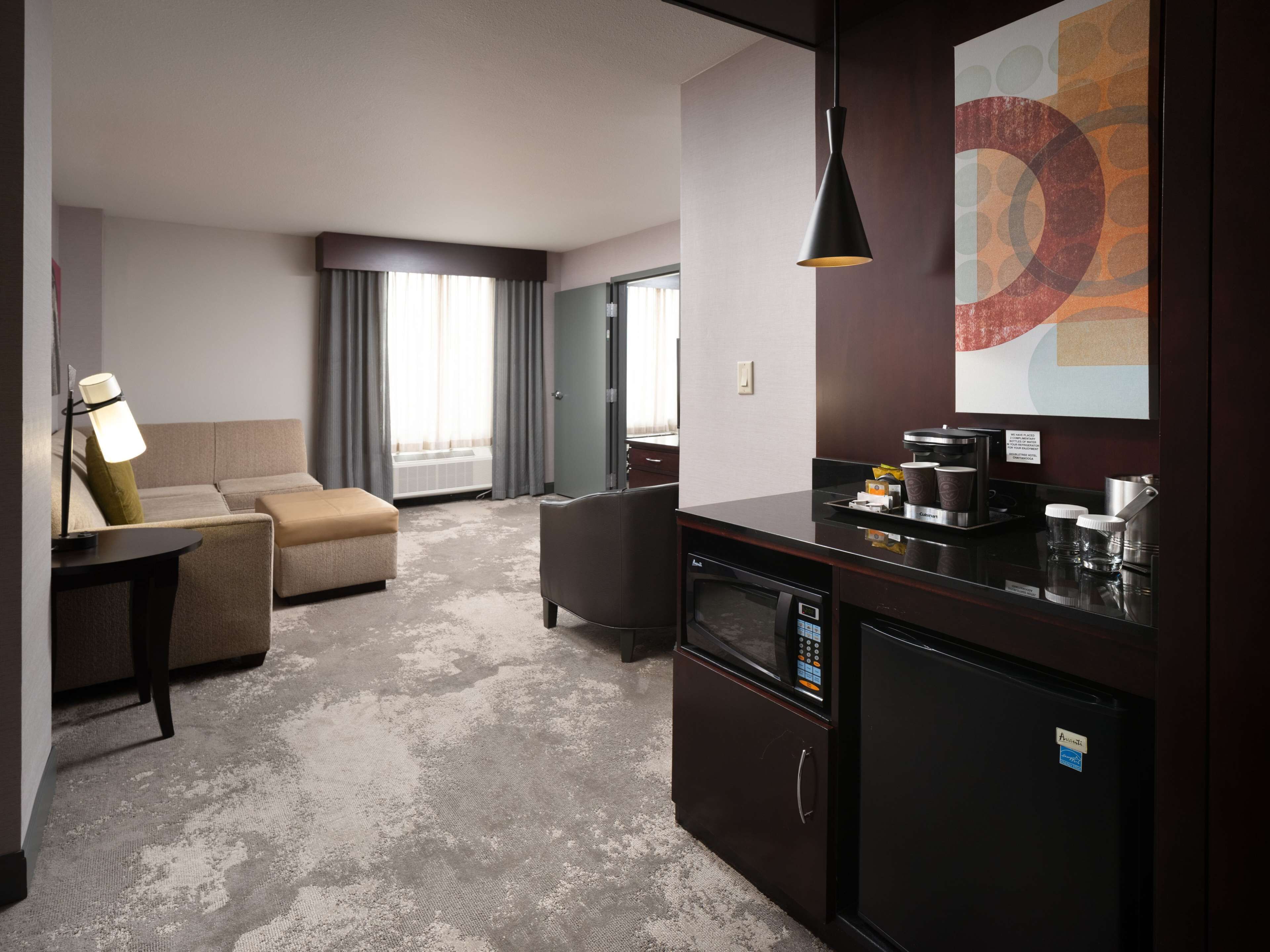 suite, 1 king bed, non smoking | down duvets, in-room safe, desk, blackout curtains