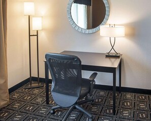 Desk, laptop workspace, blackout drapes, iron/ironing board