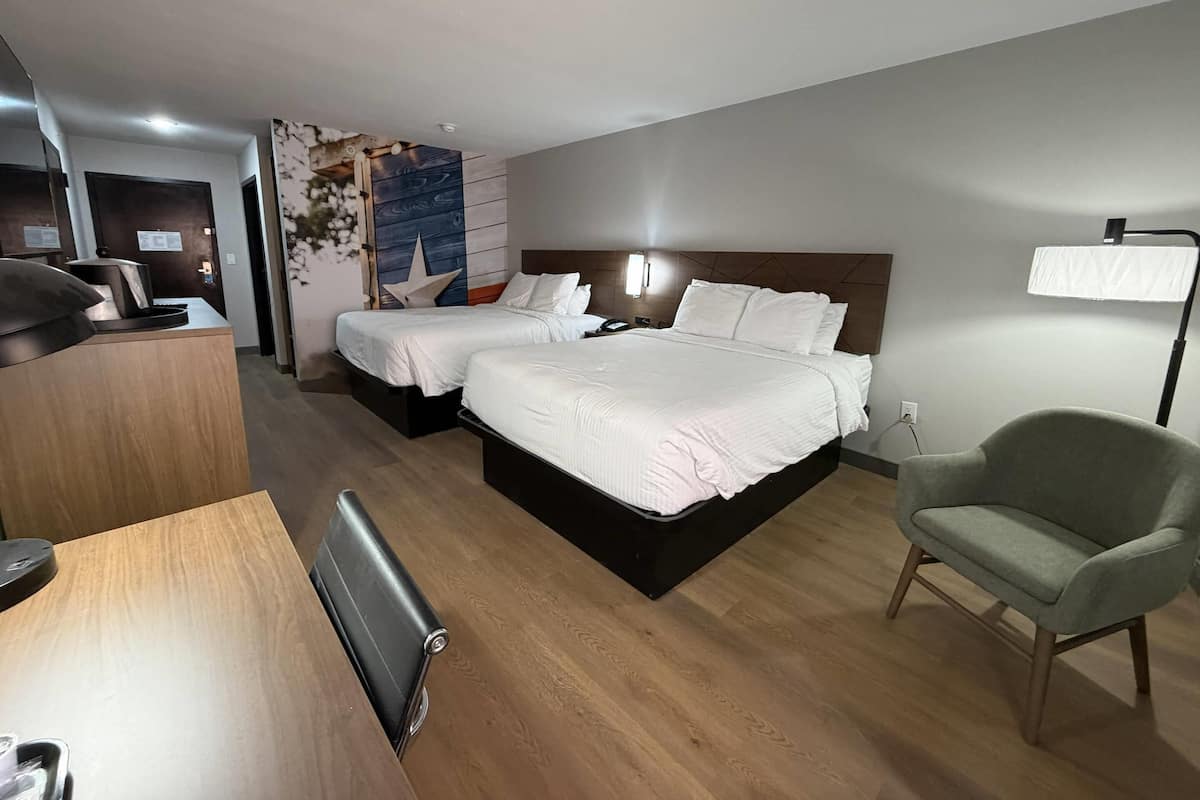 Down duvets, pillow-top beds, desk, laptop workspace