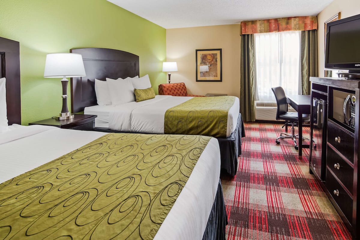 Down comforters, pillowtop beds, desk, laptop workspace