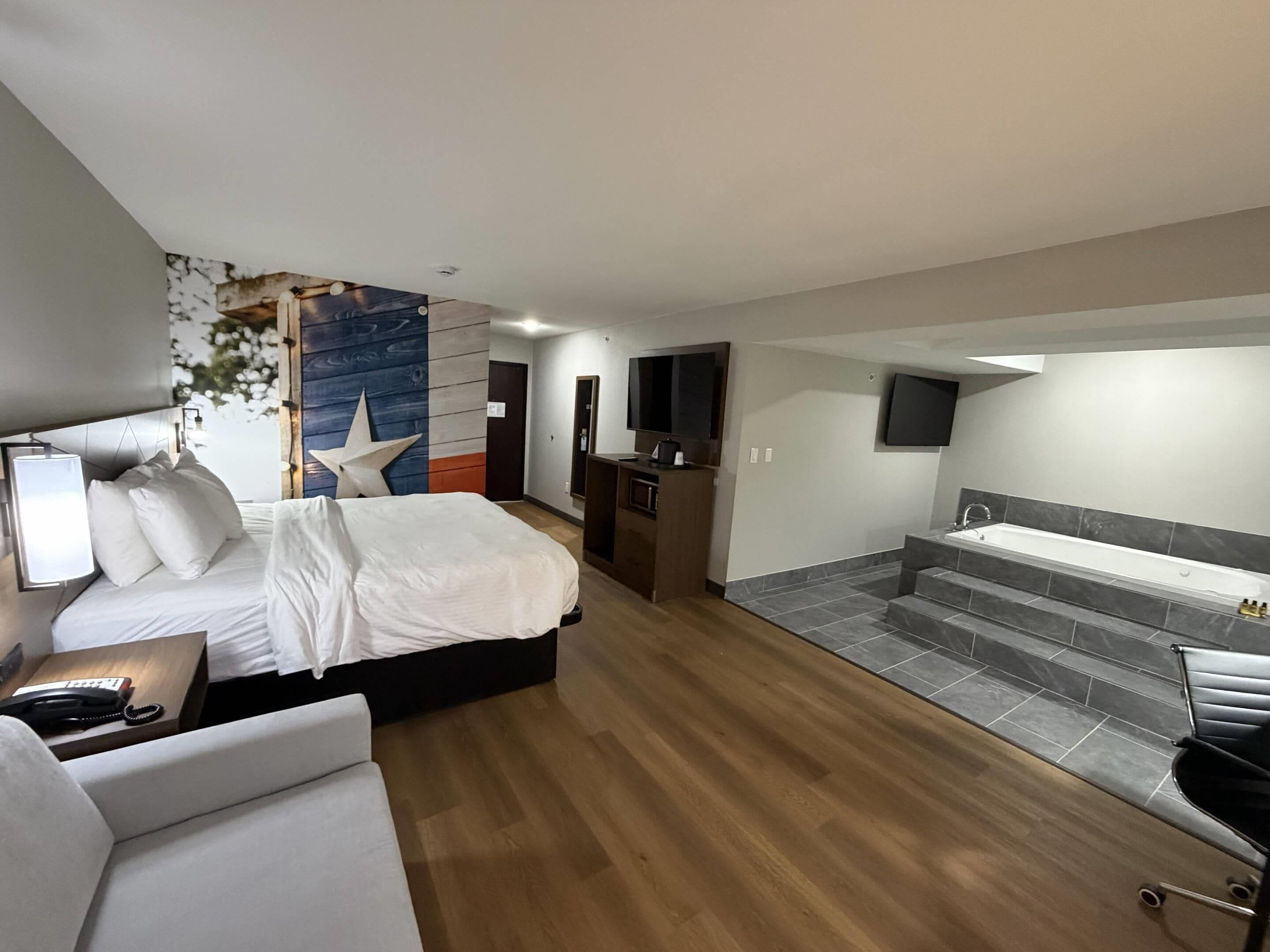 Down comforters, pillowtop beds, desk, laptop workspace