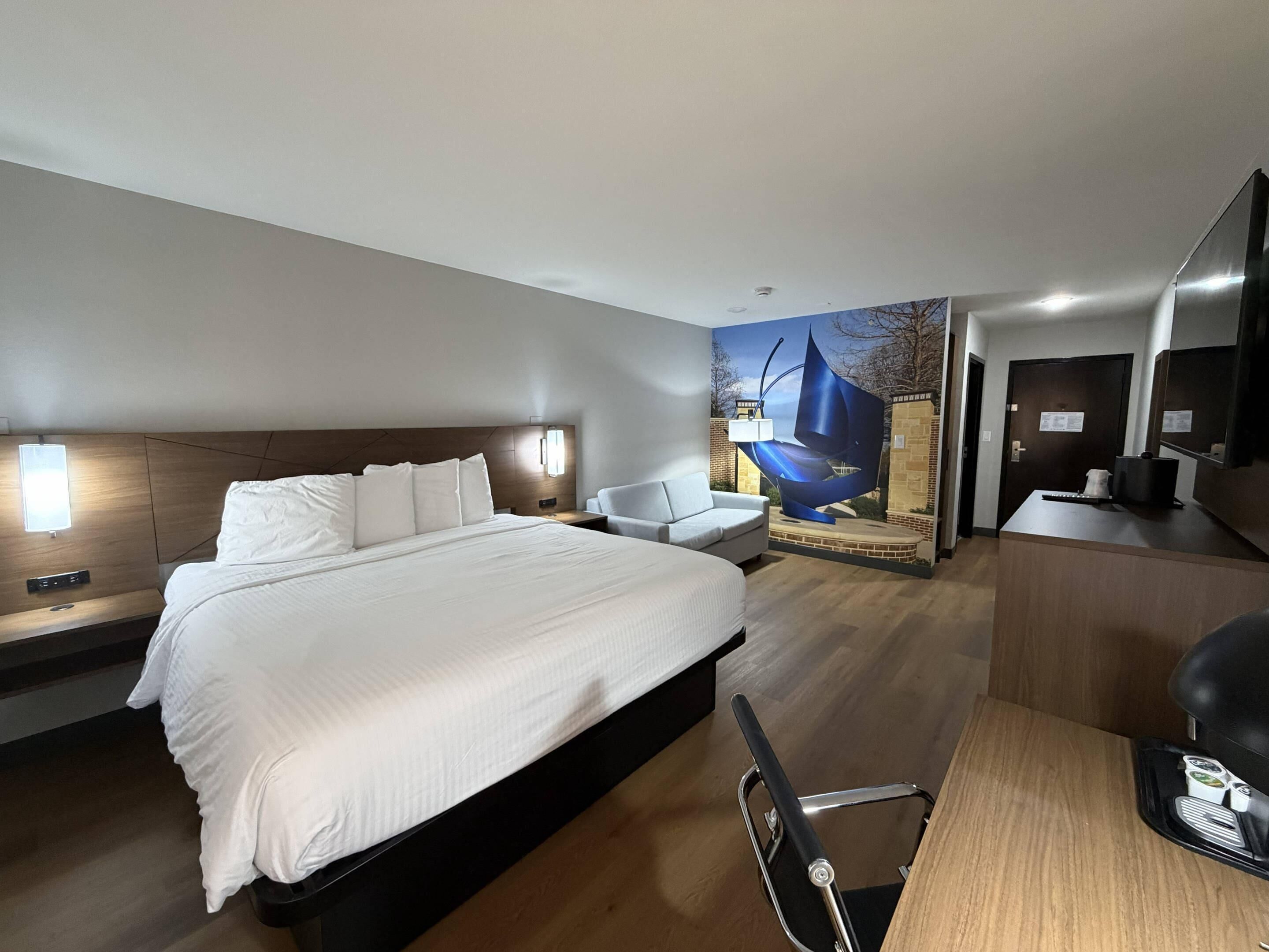 Down comforters, pillowtop beds, desk, laptop workspace