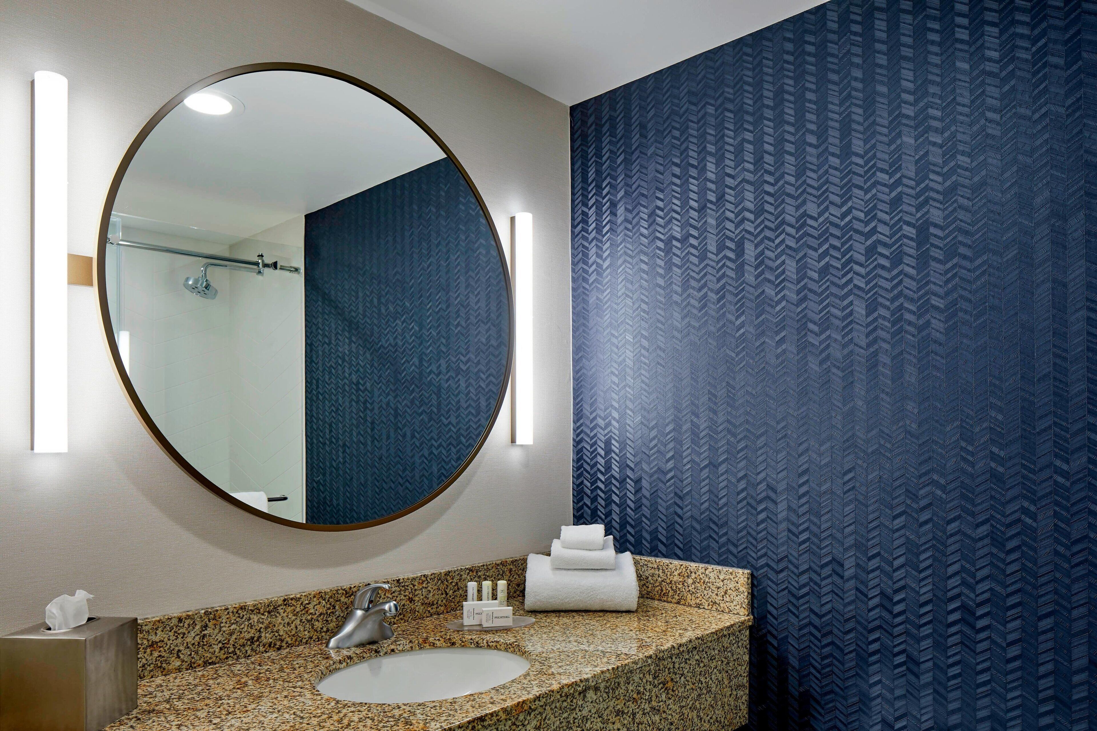 room, 1 king bed | bathroom | hair dryer, towels, soap, shampoo