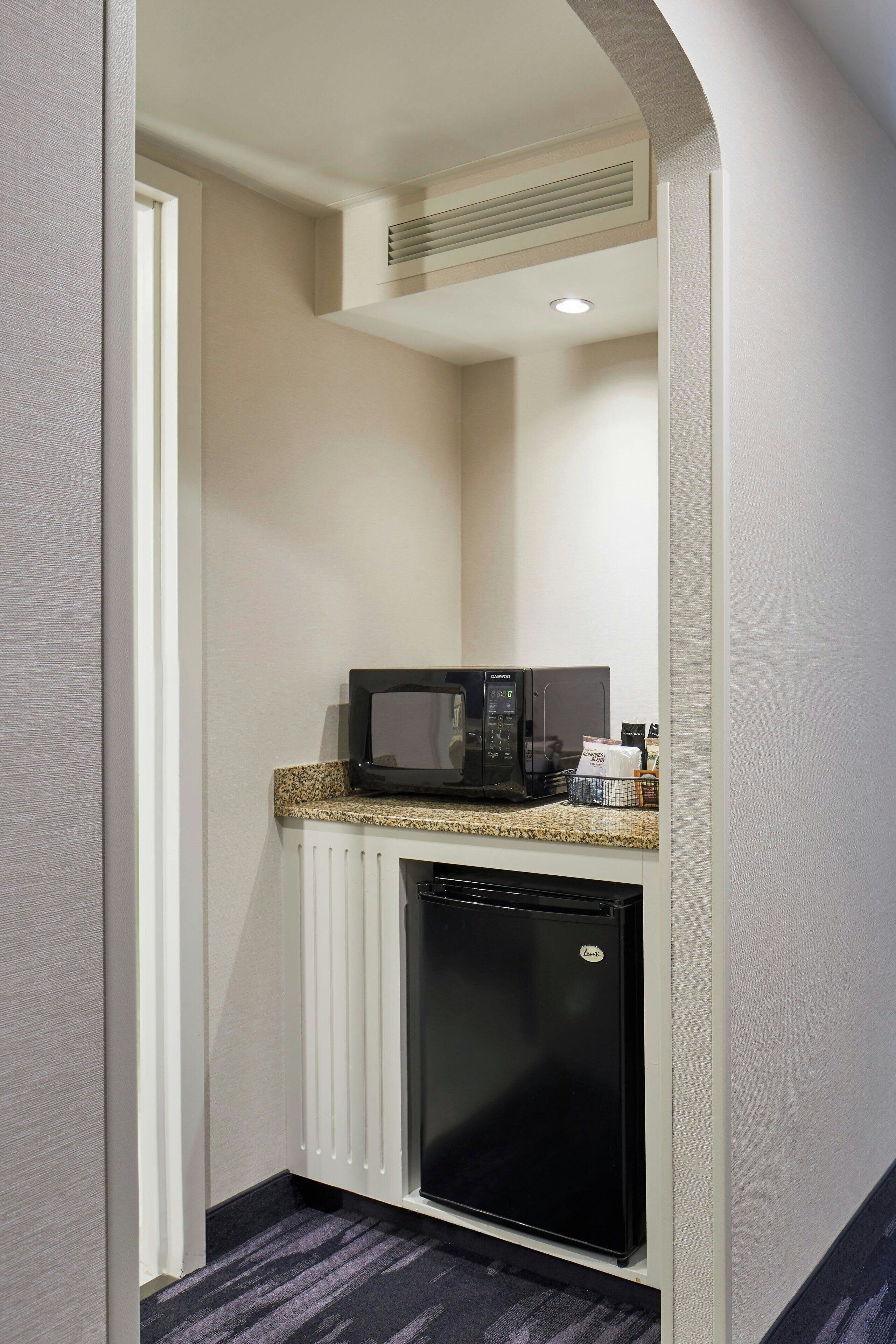 room, 1 king bed | desk, laptop workspace, iron/ironing board, free cots/infant beds