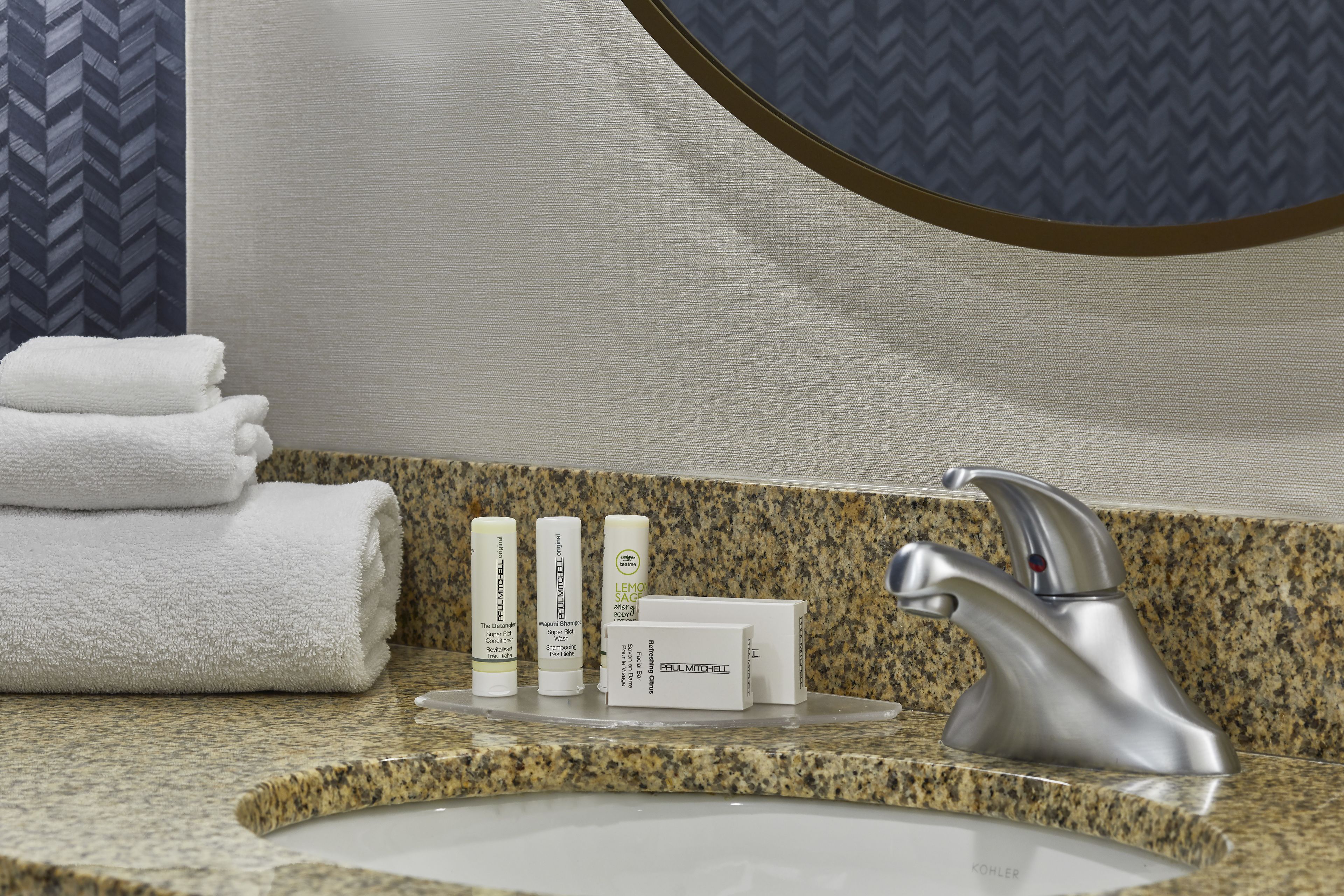 hair dryer, towels, soap, shampoo