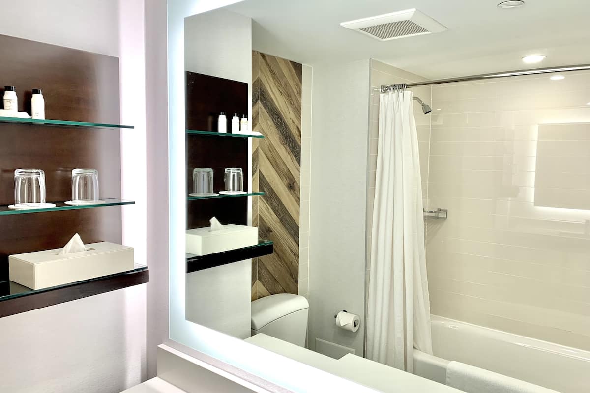 room, 2 queen beds, non smoking | bathroom | free toiletries, hair dryer, towels