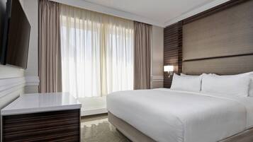 Premium bedding, pillow-top beds, desk, blackout curtains