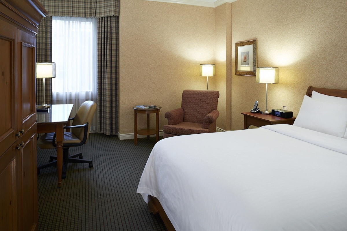 Premium bedding, desk, blackout drapes, iron/ironing board