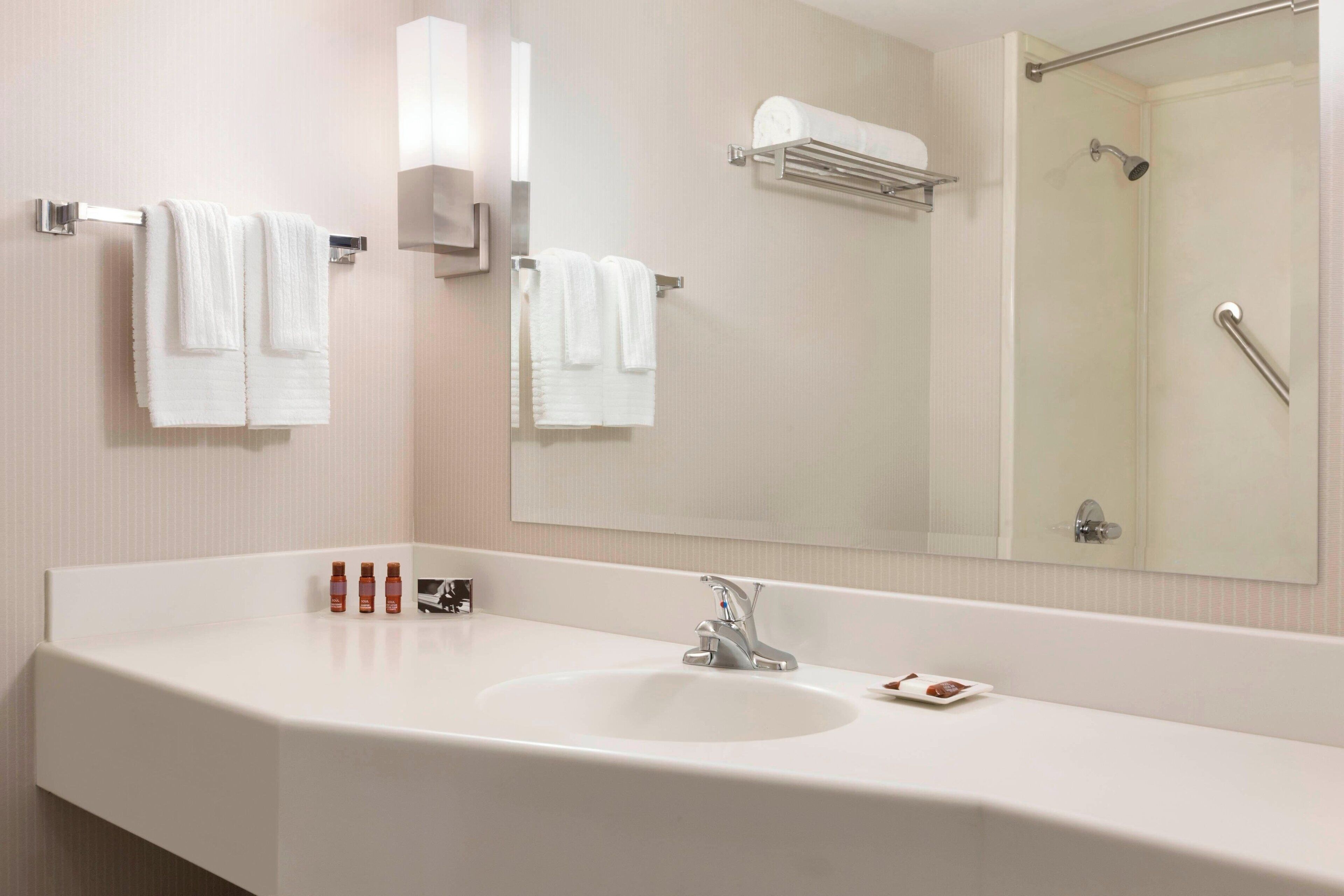 combined shower/bathtub, free toiletries, hair dryer, towels