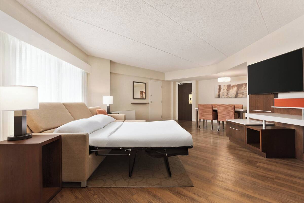 desk, laptop workspace, blackout curtains, iron/ironing board