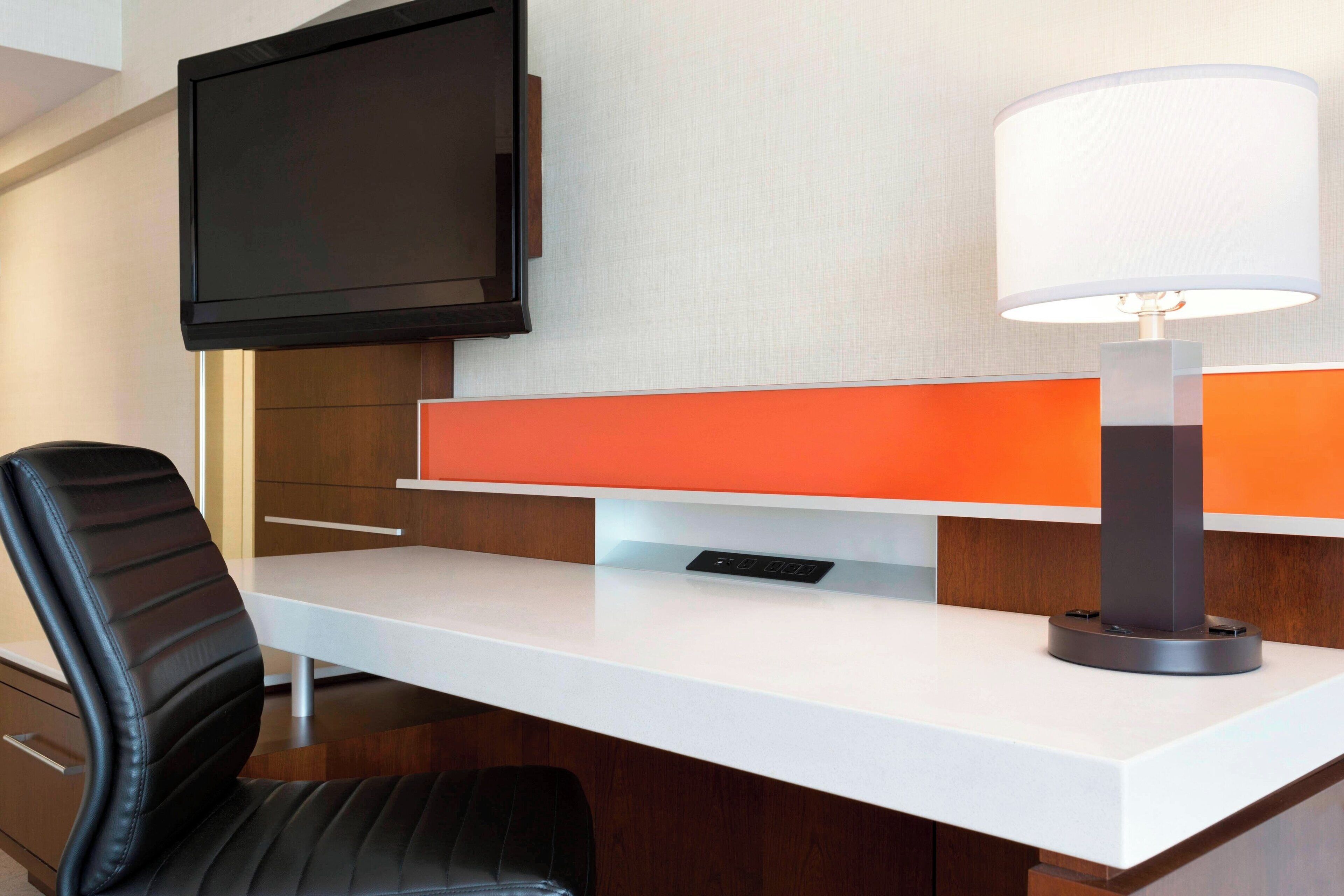 desk, laptop workspace, blackout curtains, iron/ironing board