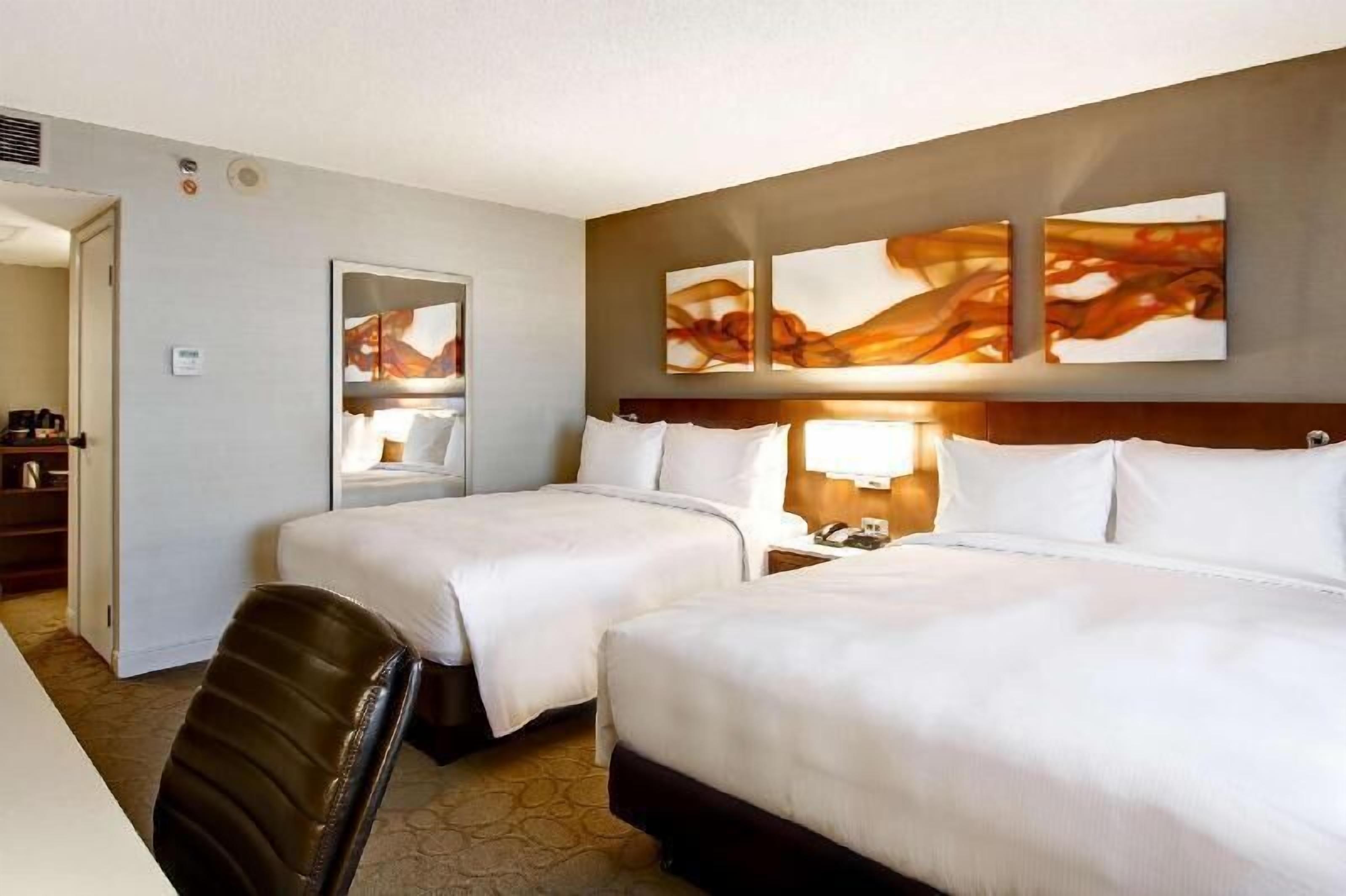 Pillowtop beds, in-room safe, desk, laptop workspace