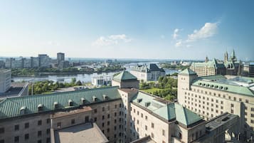 A cityscape with historic buildings and a river.