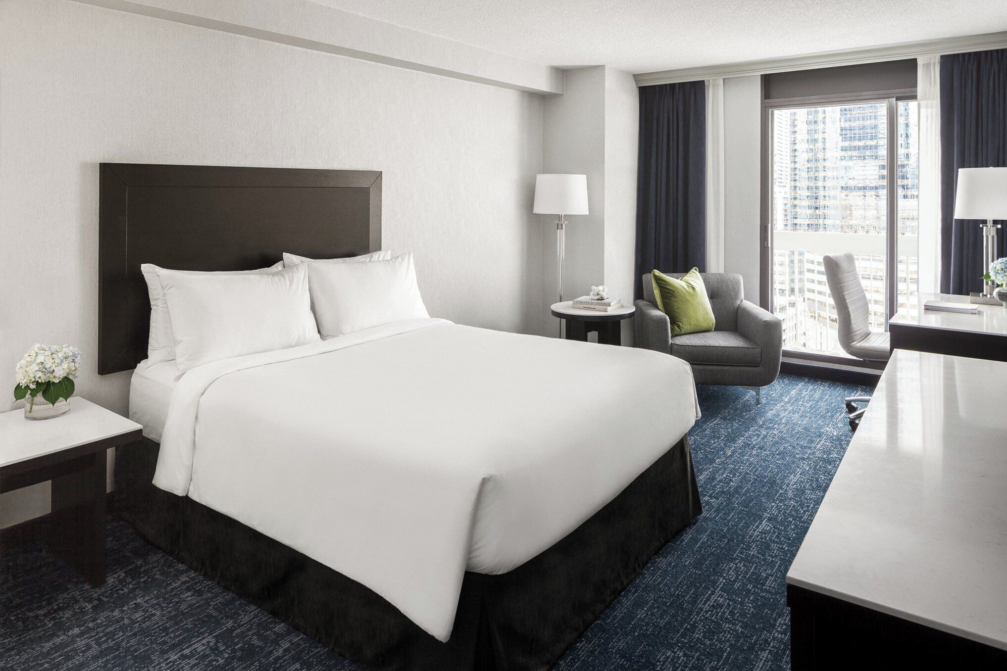 Hypo-allergenic bedding, pillowtop beds, in-room safe, desk