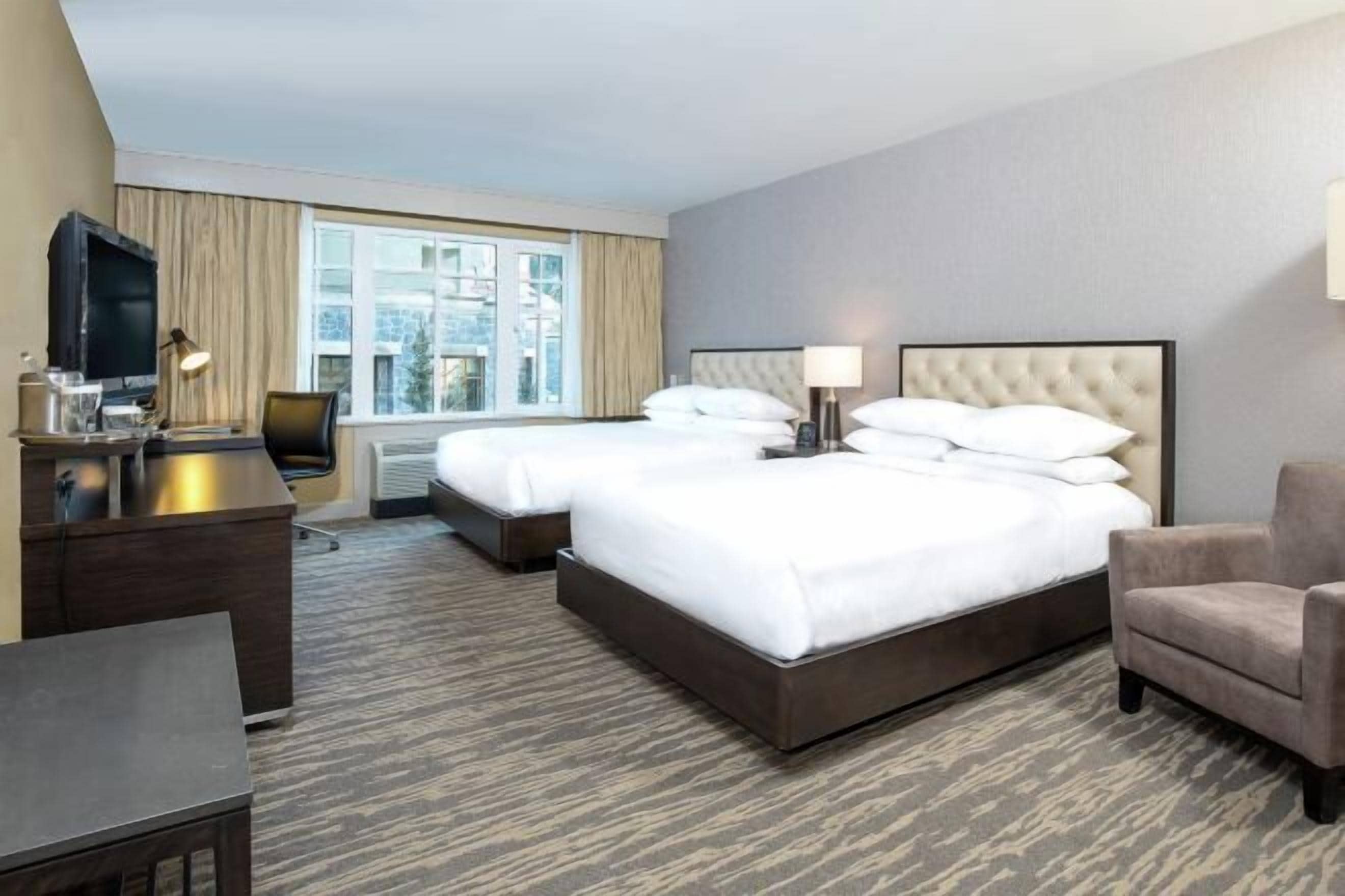 Premium bedding, down comforters, in-room safe, desk