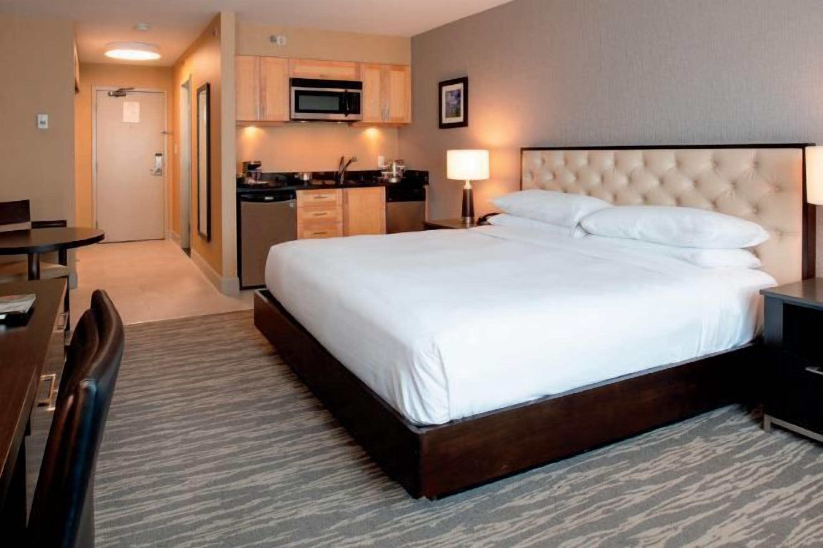 Premium bedding, down comforters, in-room safe, desk