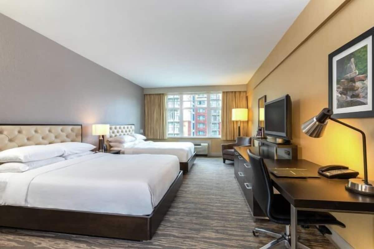 Premium bedding, down comforters, in-room safe, desk