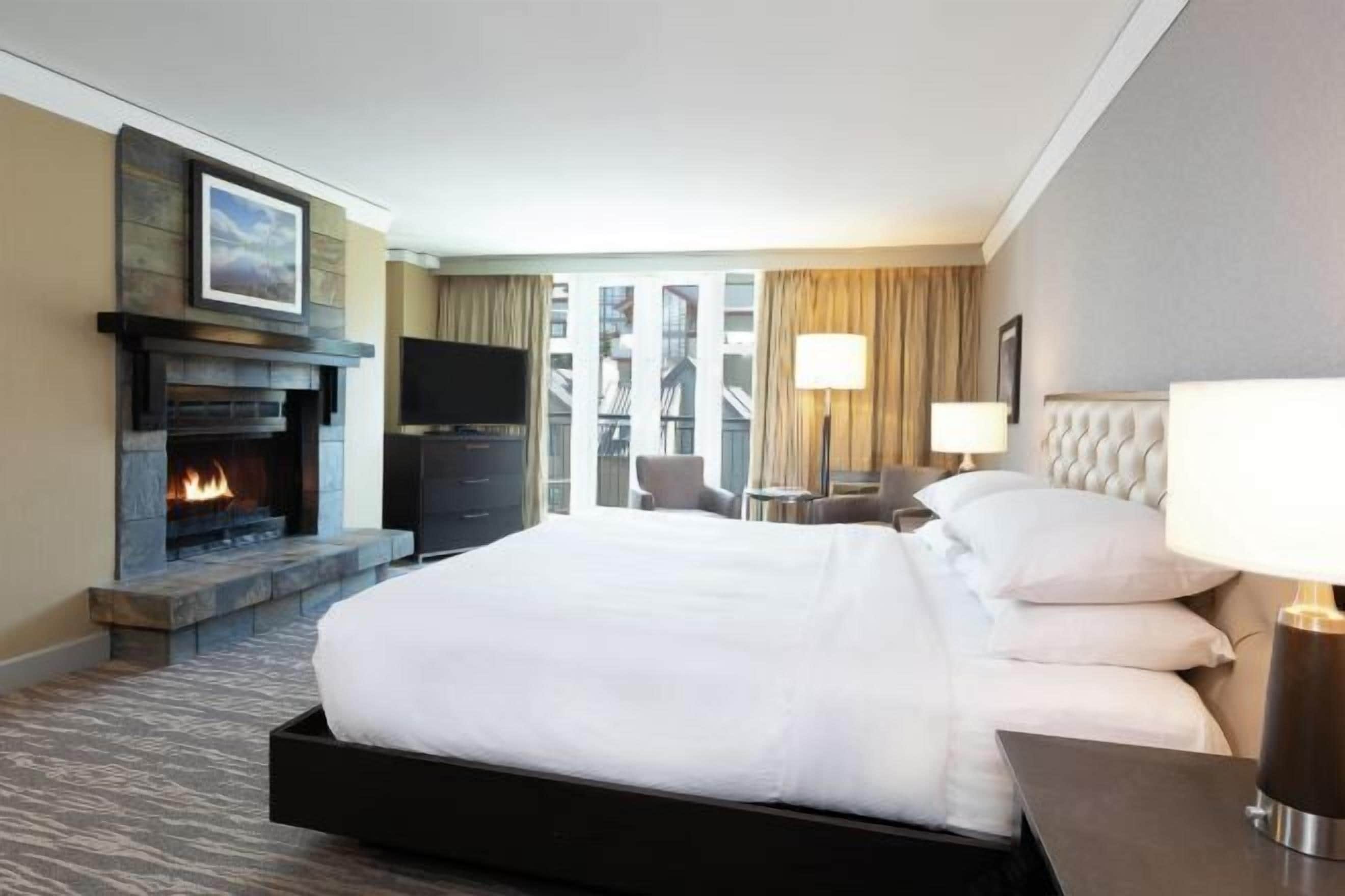 Premium bedding, down comforters, in-room safe, desk