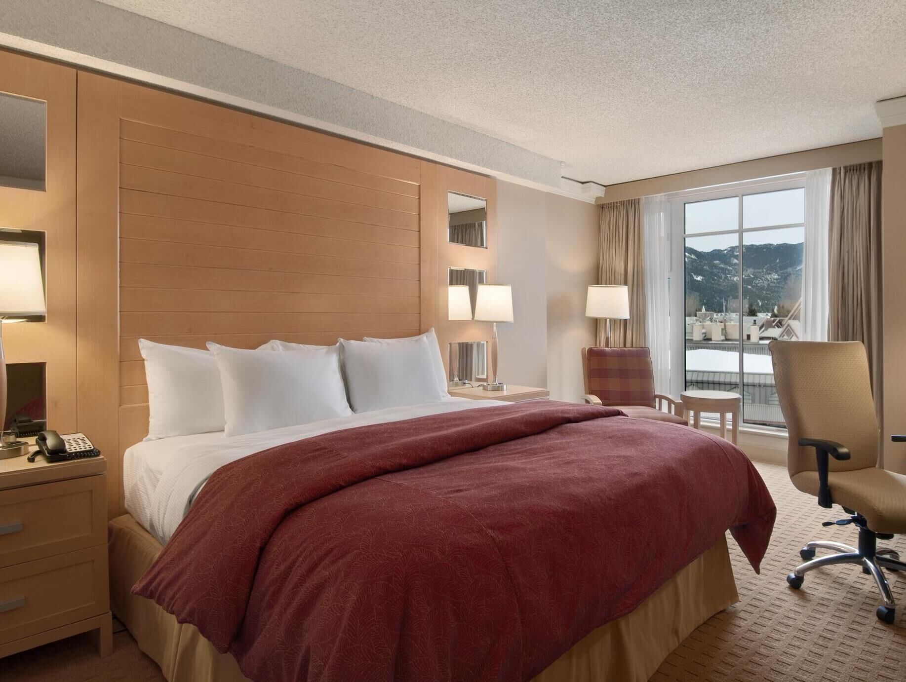 Premium bedding, down duvets, in-room safe, desk