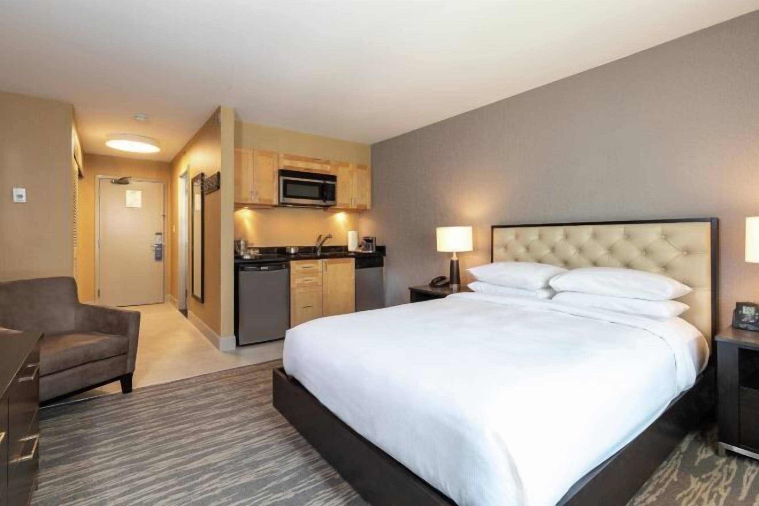 Premium bedding, down comforters, in-room safe, desk