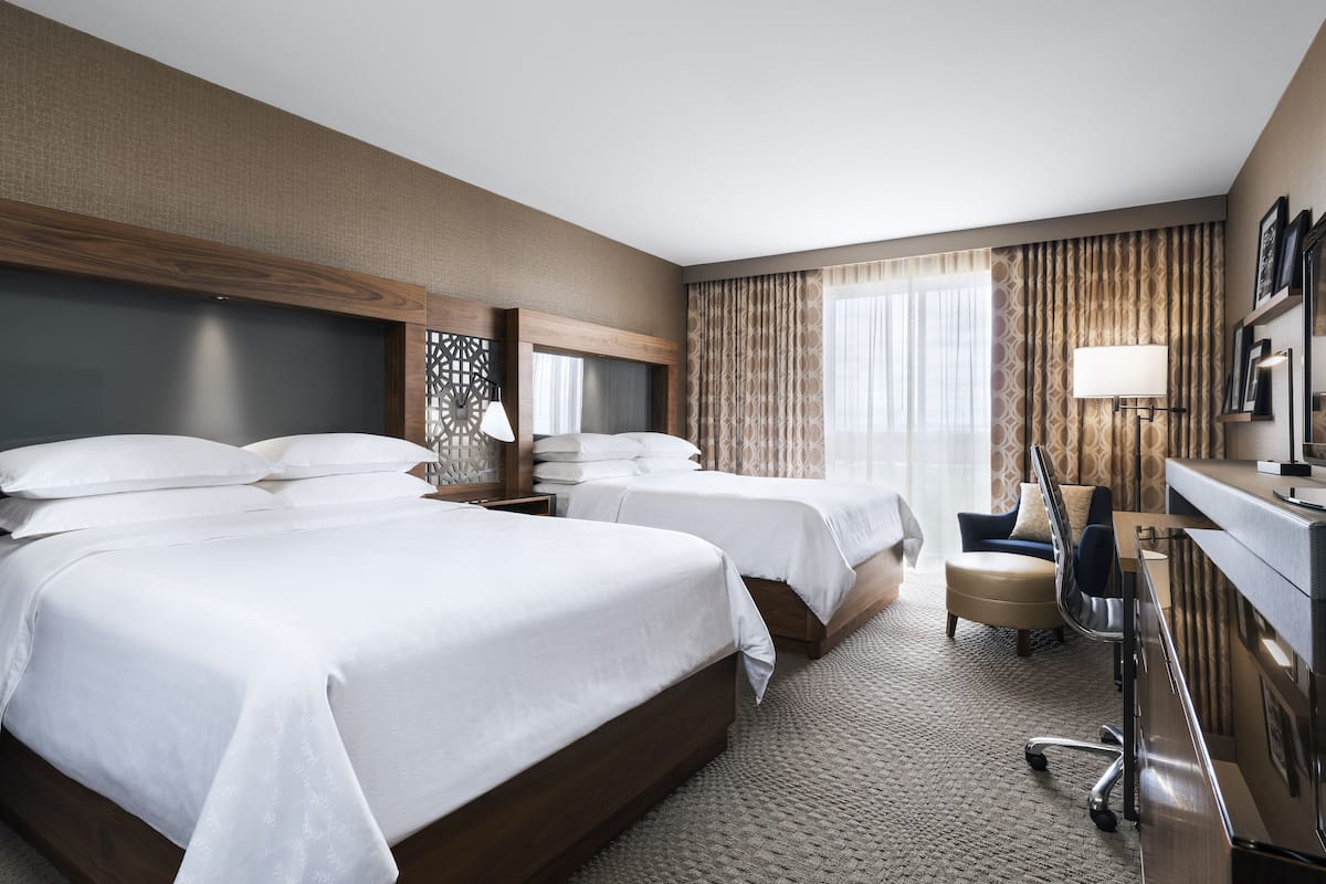 Premium bedding, down duvets, in-room safe, desk