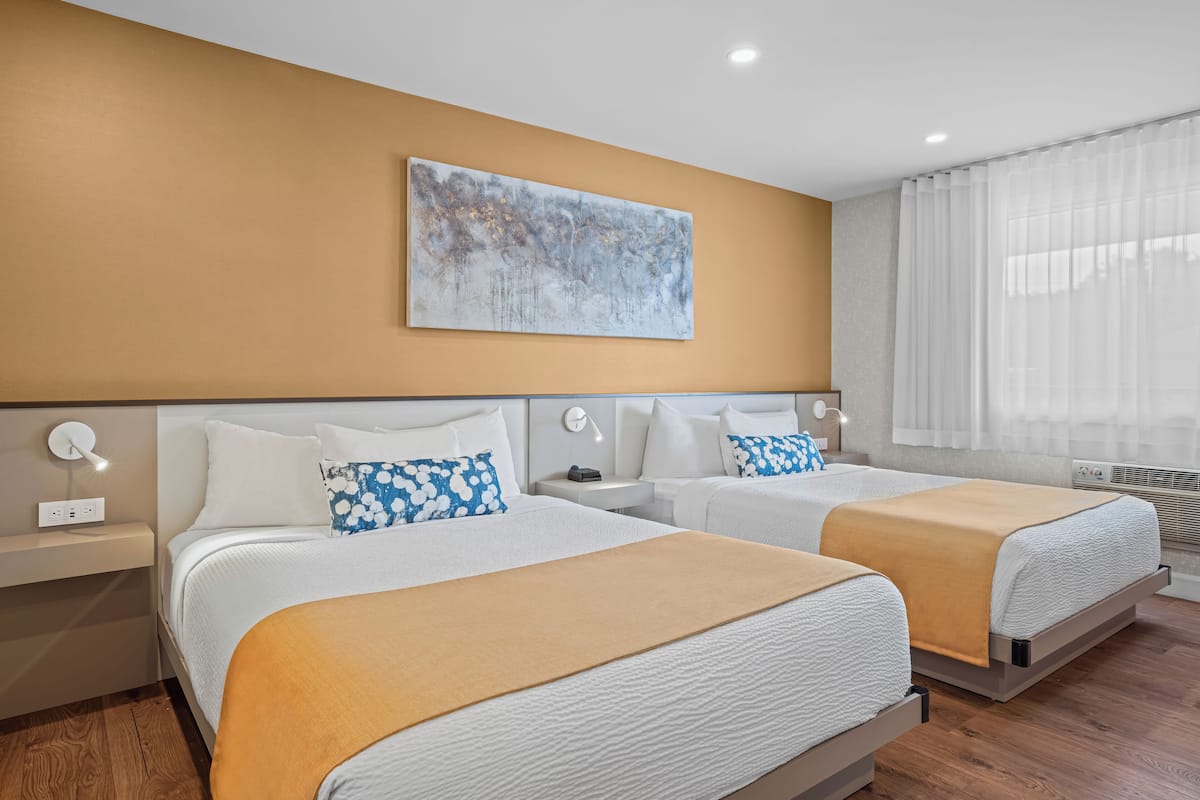Room, 2 Queen Beds, Non Smoking | Premium bedding, individually decorated, individually furnished, desk