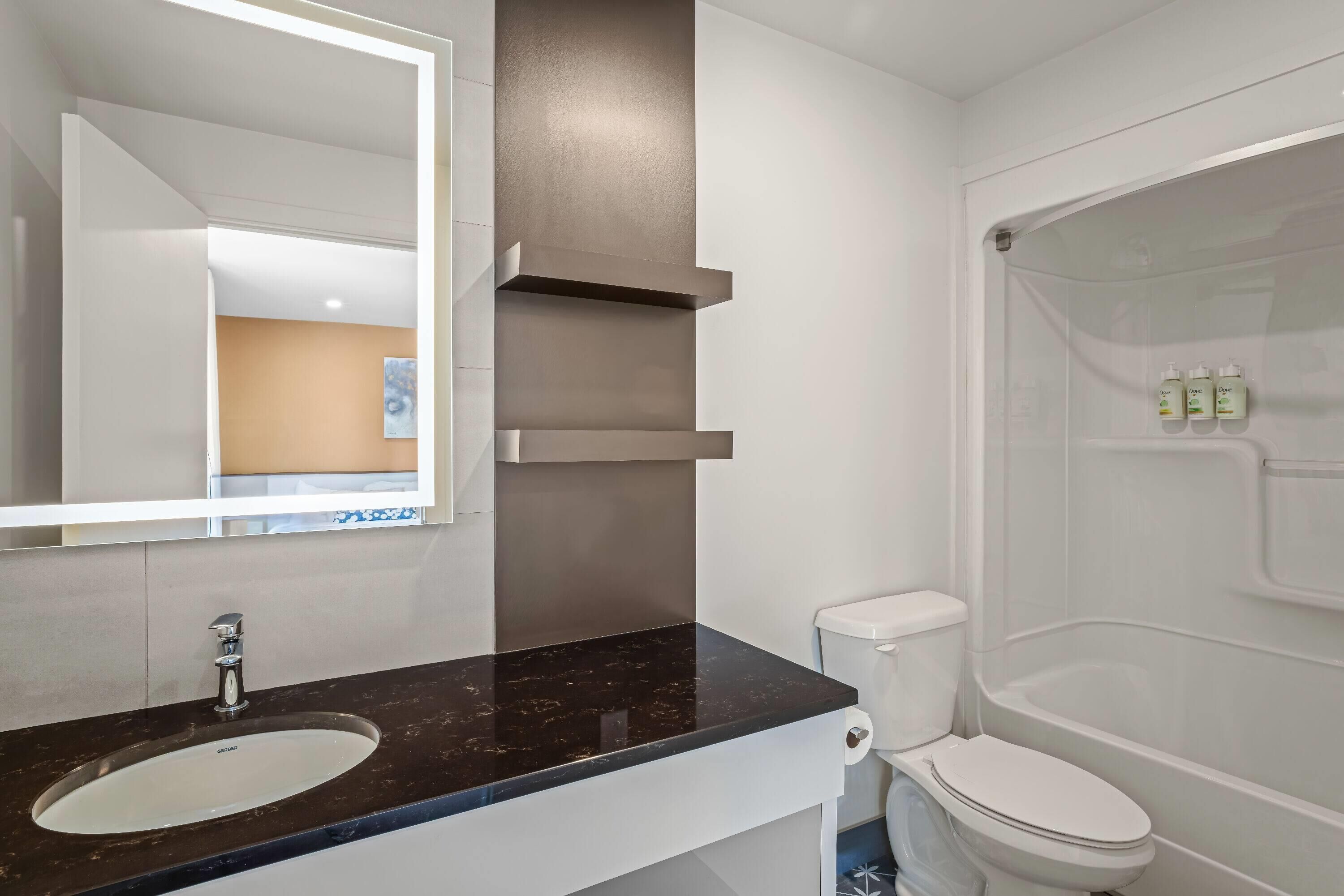 room, 2 queen beds, non smoking, balcony (garden side) | bathroom | combined shower/bathtub, free toiletries, hair dryer, towels