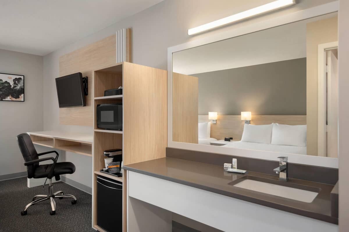 standard room, 2 queen beds | laptop workspace, blackout curtains, iron/ironing board, free wifi