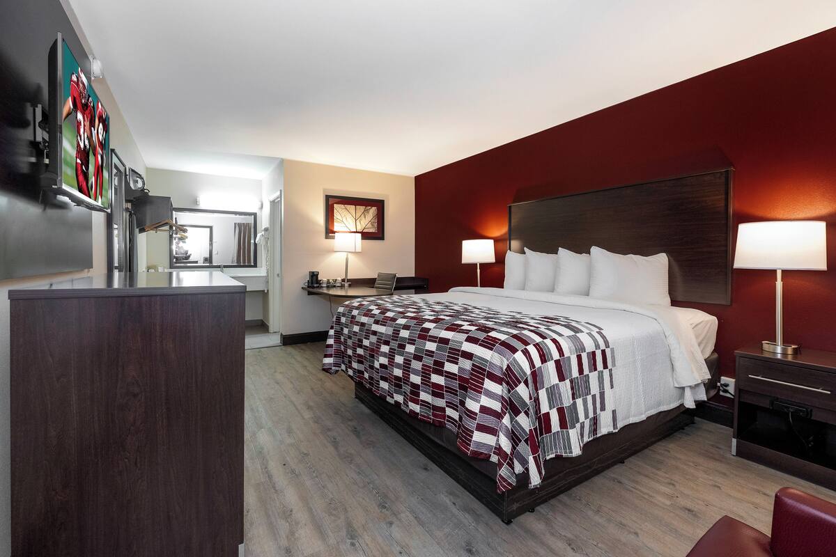 Desk, laptop workspace, blackout curtains, free WiFi