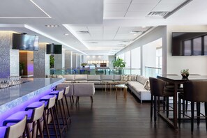 3 bars/lounges, poolside bar, beach bar