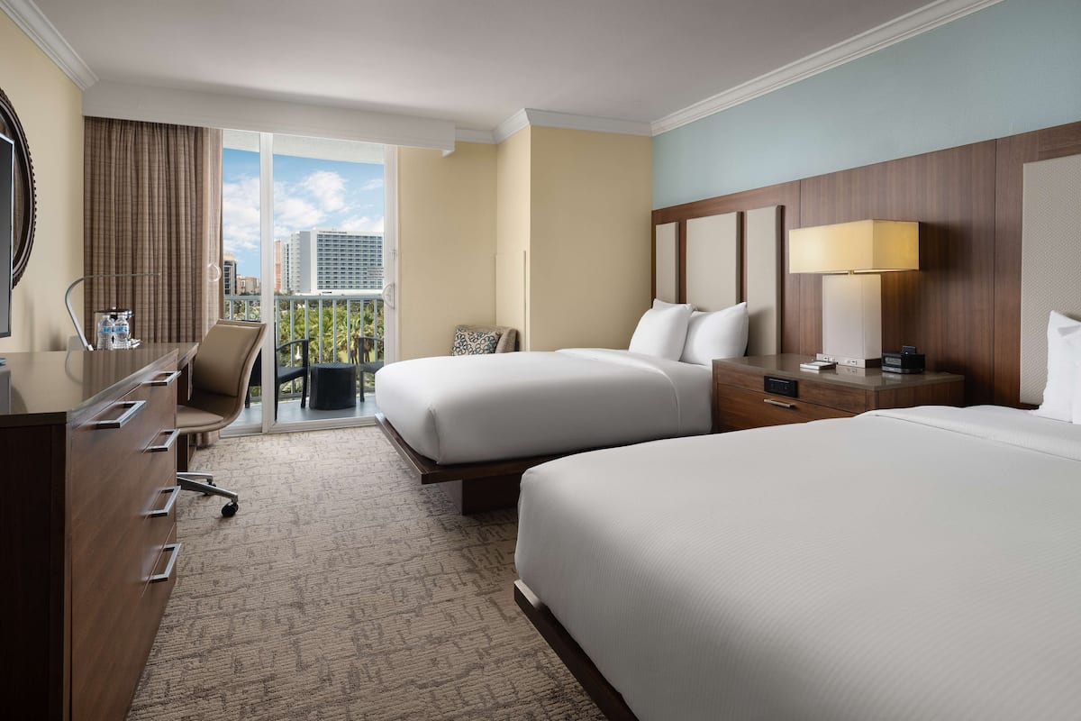 Hypo-allergenic bedding, pillowtop beds, in-room safe, desk