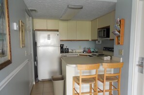 Economy Condo, 1 Bedroom | Individually decorated, individually furnished, desk, iron/ironing board