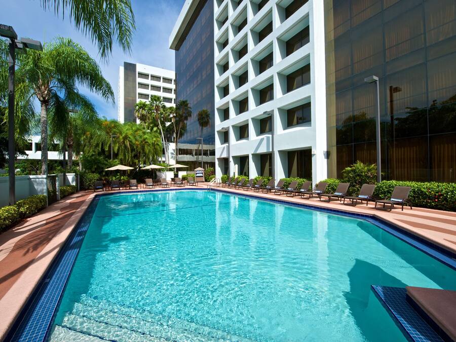 Outdoor pool, open 6:30 AM to 7:00 PM, pool umbrellas, pool loungers