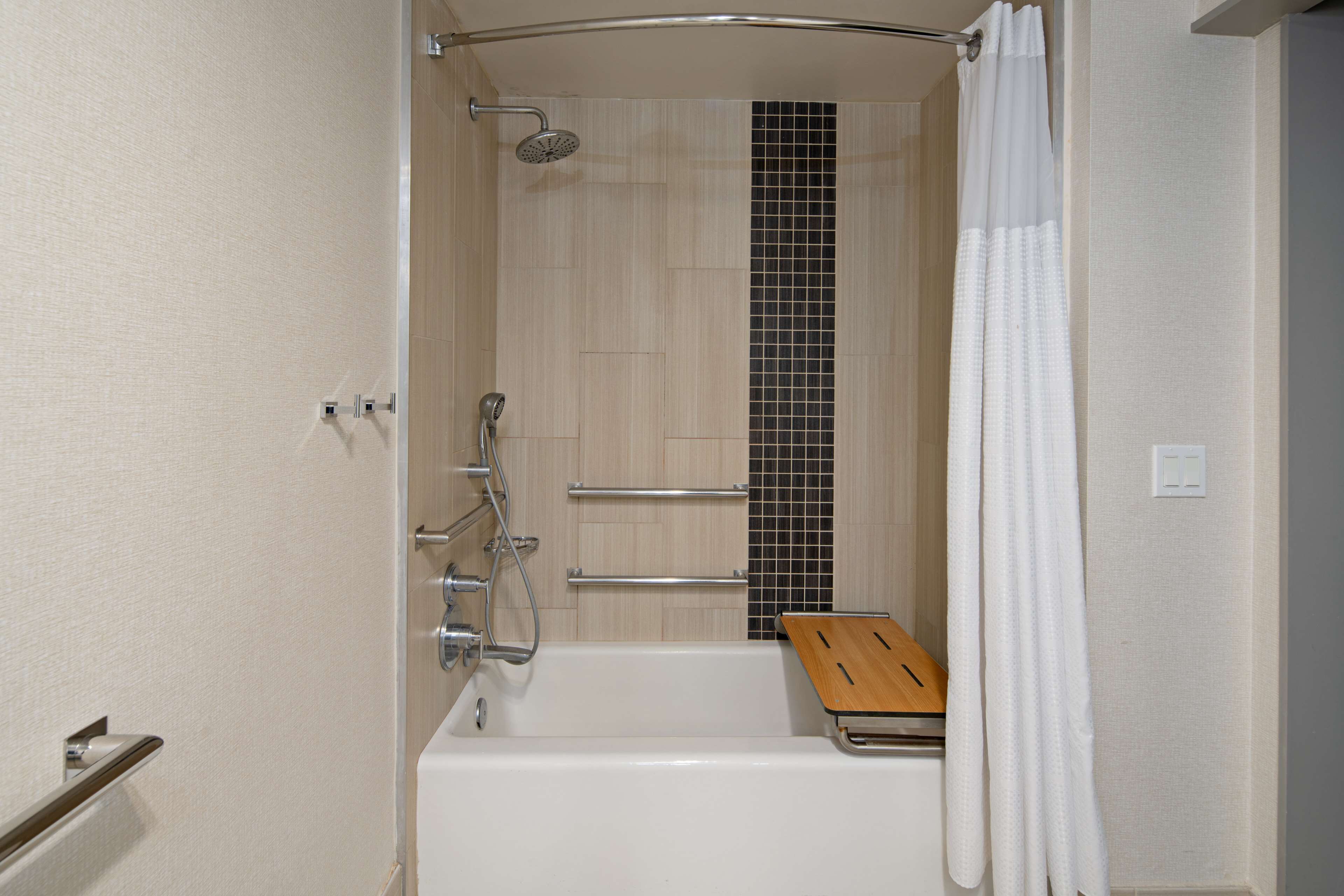suite, 2 double beds, accessible, bathtub | bathroom | combined shower/bathtub, designer toiletries, hair dryer, towels