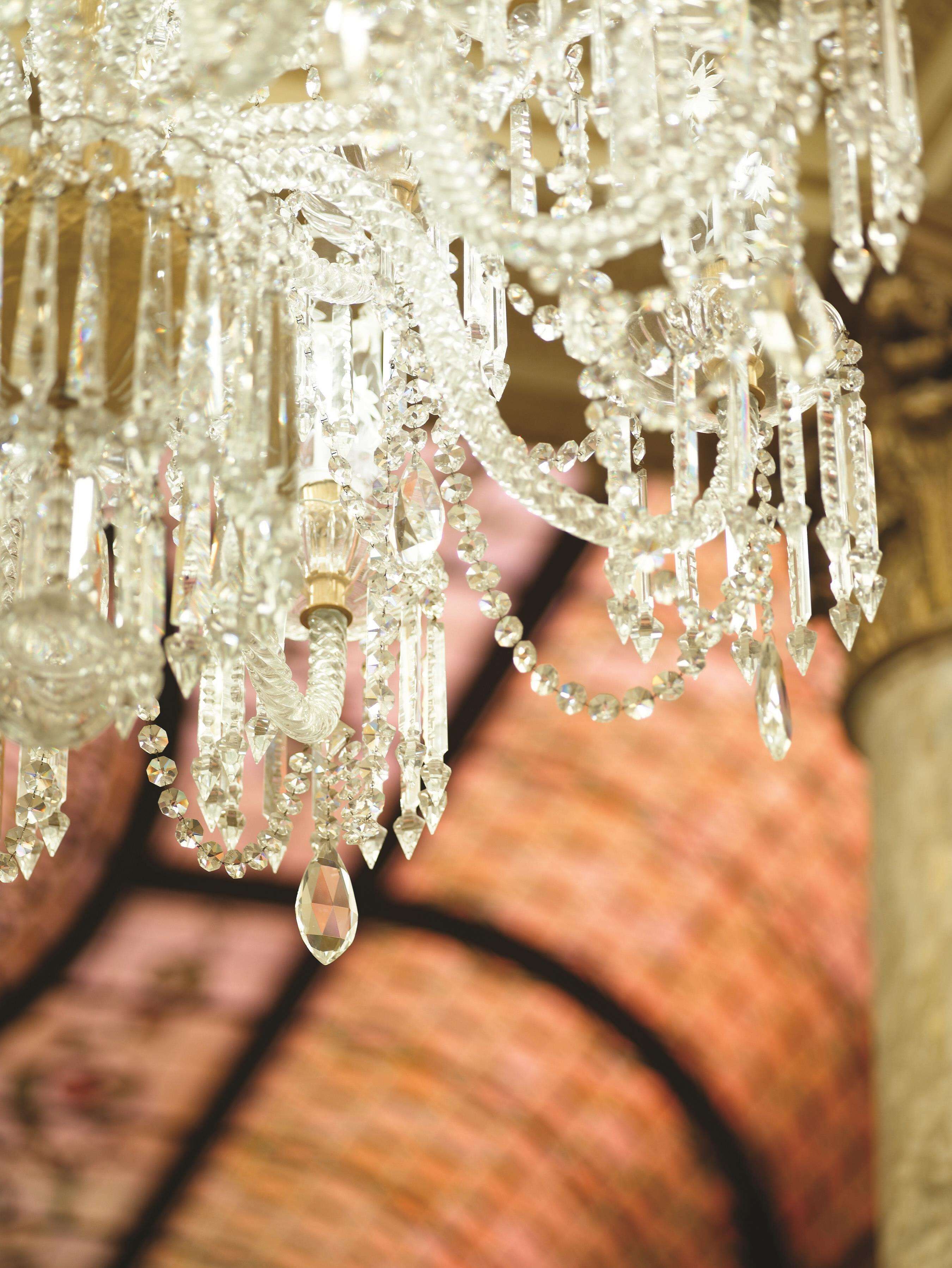 A chandelier with multiple crystal elements.