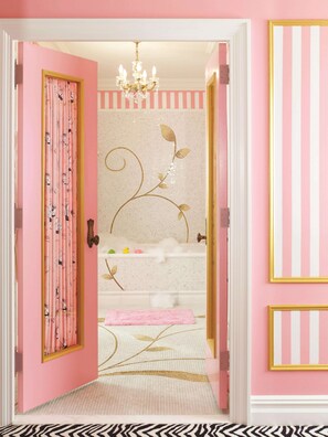 Premium bedding, down comforters, pillowtop beds, minibar